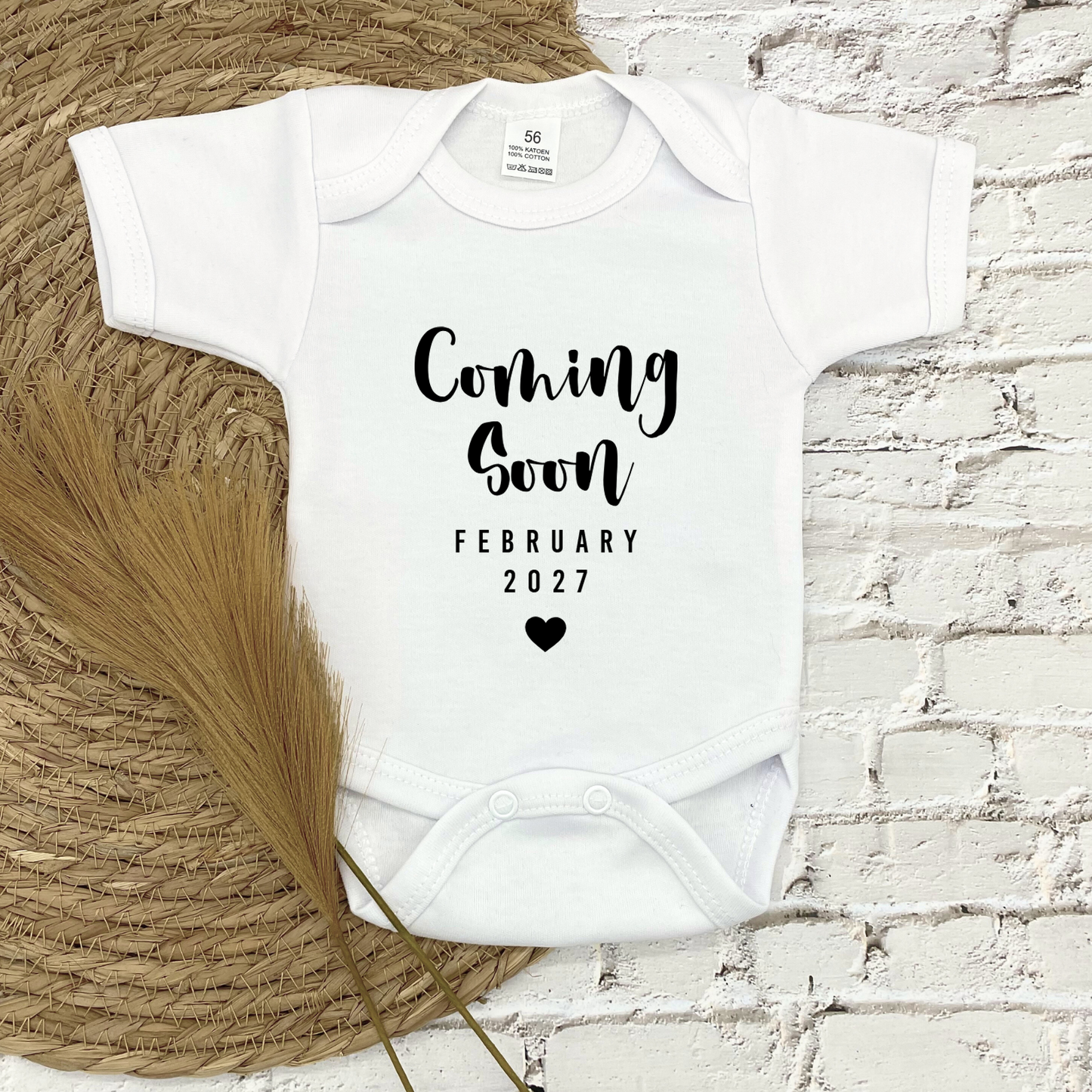 Aankondiging "COMING SOON" rompertje met datum