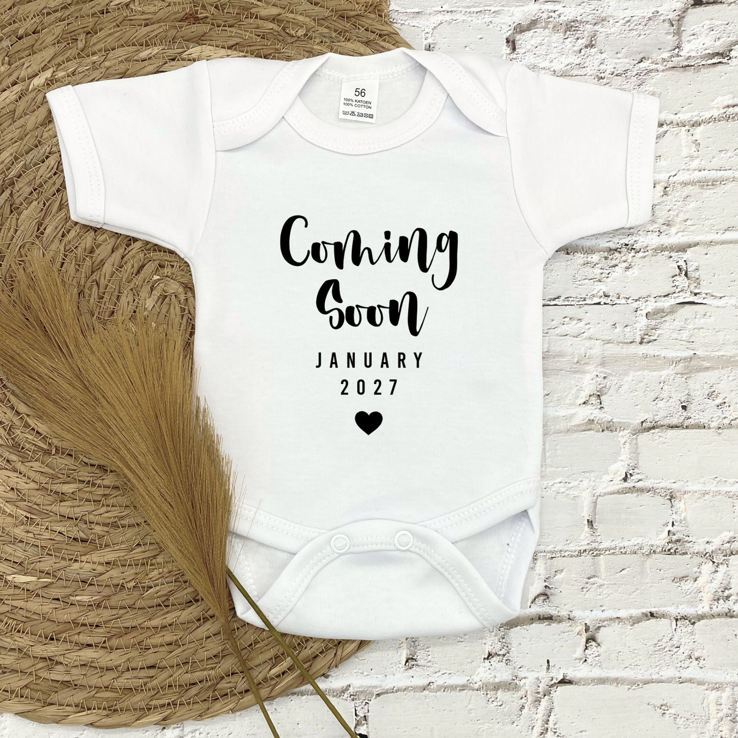 Aankondiging "COMING SOON" rompertje met datum