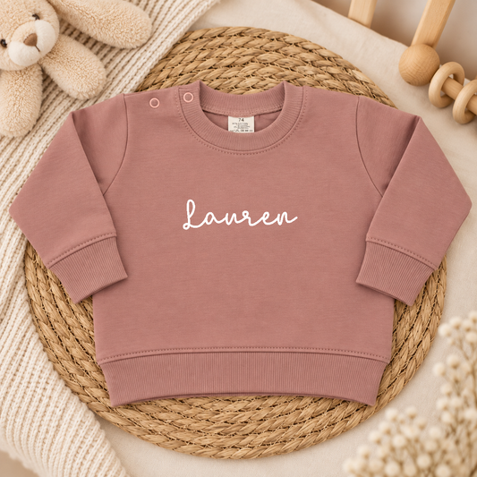 Roze baby trui gepersonaliseerd met naam