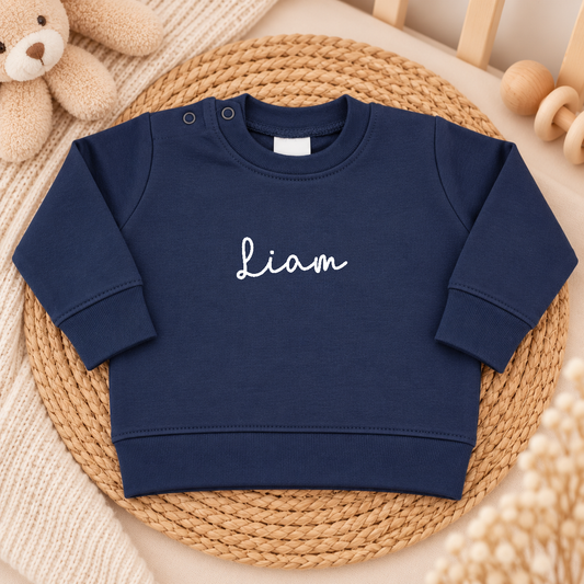 Donkerblauwe baby trui gepersonaliseerd met naam
