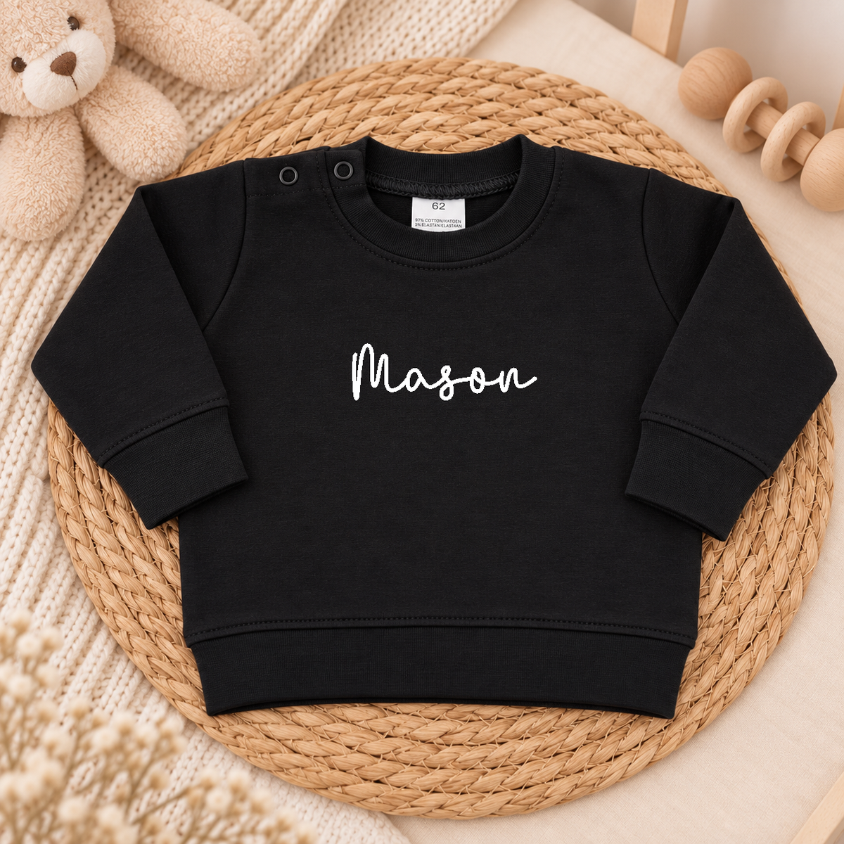 Zwarte baby trui gepersonaliseerd met naam