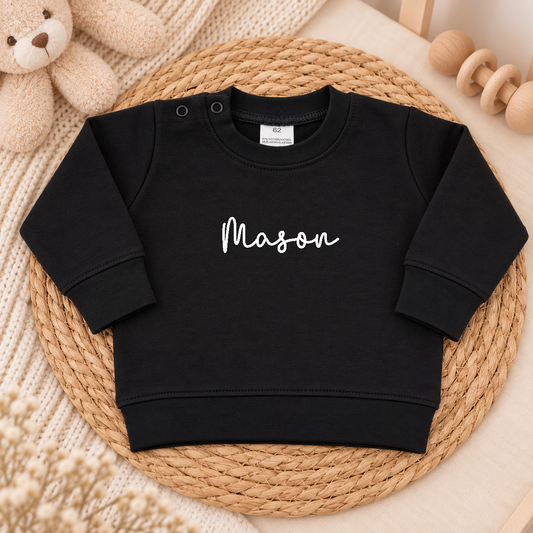 Zwarte baby trui gepersonaliseerd met naam